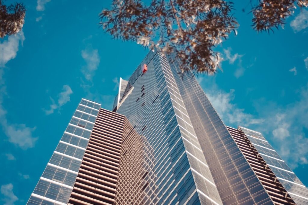 Low-angle view of tall modern commercial buildings
