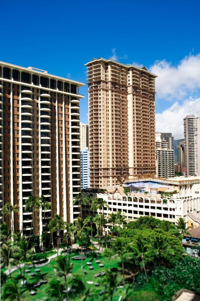 Tall brown skyscraper building against clear blue sky